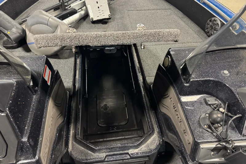 Slide: The Image of Interior view of a 2020 Nitro ZV20 boat, showcasing storage compartment and seating area. - 12