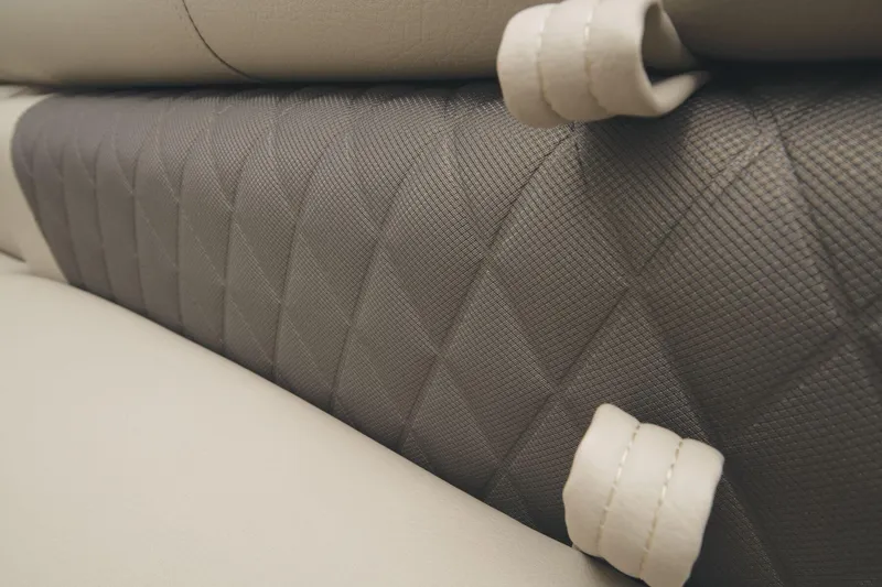 Slide: The Image of Close-up of upholstery on a 2023 Sun Tracker Party Barge 20 DLX. - 24