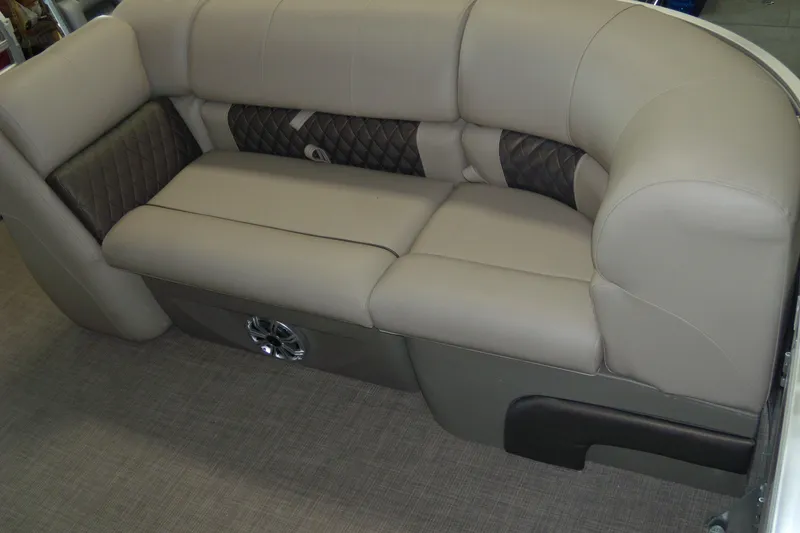 Slide: The Image of 2023 Sun Tracker Party Barge 20 DLX seating with beige upholstery and quilted accents. - 3