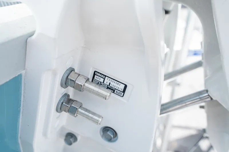 Slide: The Image of Close-up of Yamaha engine mounts on a 2026 Sea Hunt Ultra 235 SE. - 22