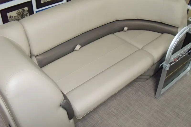 Slide: The Image of 2024 Sun Tracker Party Barge 18 DLX interior seating, beige and gray upholstery. - 4