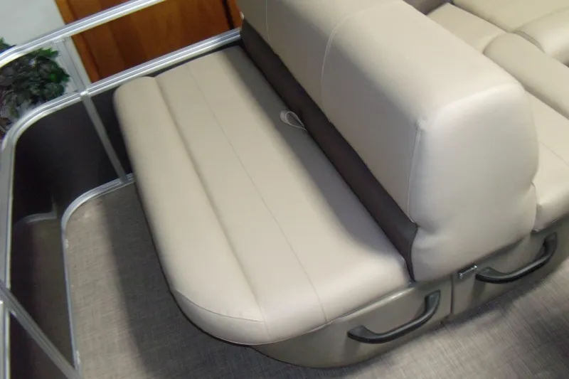 Slide: The Image of 2024 Sun Tracker Party Barge 18 DLX seating area with beige upholstery. - 5