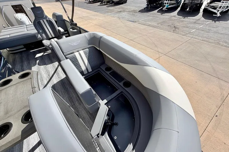 Slide: The Image of 2026 Bennington 23 M Swingback boat interior with luxurious seating and cup holders. - 19