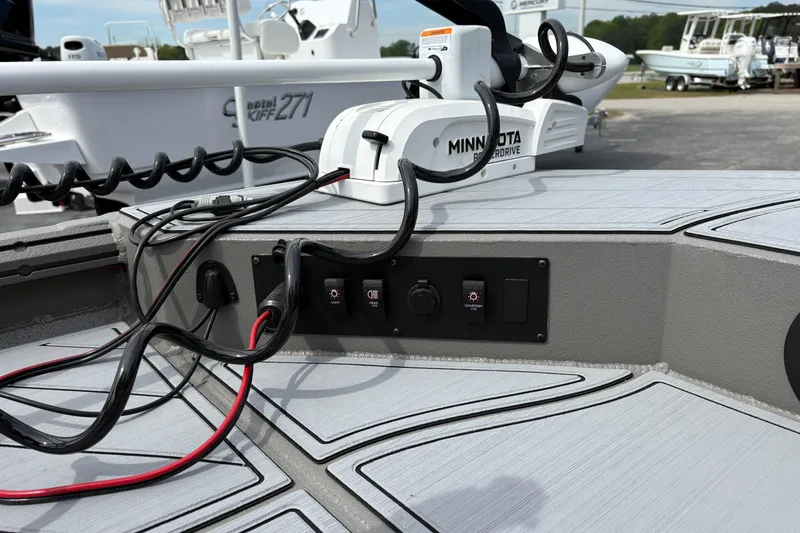 Slide: The Image of Control panel and wiring on a 2025 Thor Lake Hammer 1900CC Elite boat. - 17