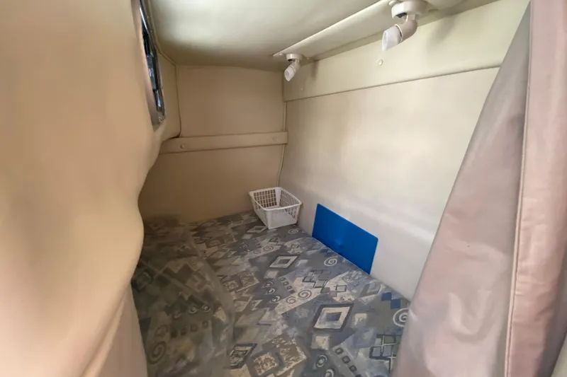 Slide: The Image of Interior cabin of 2002 Chaparral Signature 240 boat with patterned flooring. - 26