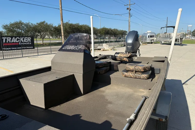 Slide: The Image of 2020 Alweld 1748 Flat Marsh Console SC boat with camo seats and 60 HP motor. - 6