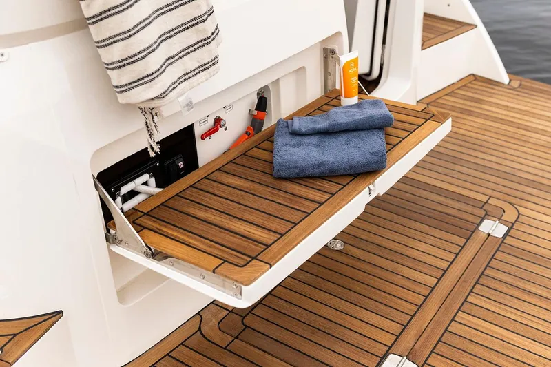 Slide: The Image of Manufacturer Provided Image: Marex 330 Scandinavia 2026 with wooden deck and towels. - 7