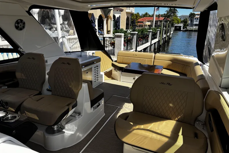 Slide: The Image of Luxurious interior of 2023 Sea Ray SLX 400 yacht with elegant seating and waterfront view. - 28