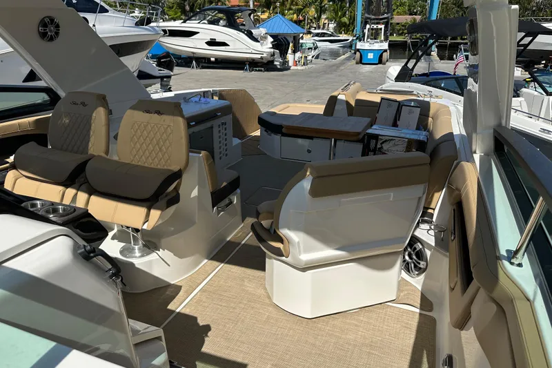 Slide: The Image of Luxurious interior of 2023 Sea Ray SLX 400 boat with plush seating and modern amenities. - 29