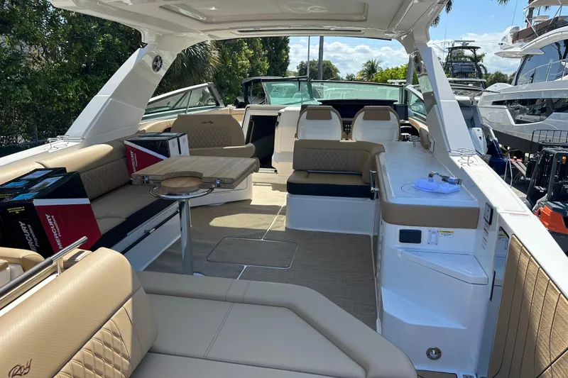 Slide: The Image of Luxurious 2023 Sea Ray SLX 400 boat interior with plush seating and modern amenities. - 36