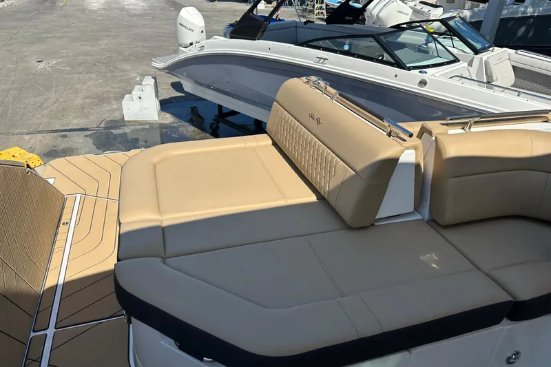 Slide: The Image of 2023 Sea Ray SLX 400 boat with luxurious tan seating and sleek design. - 40