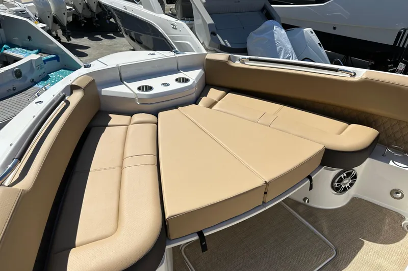 Slide: The Image of Luxurious seating area on 2023 Sea Ray SLX 400 boat with beige upholstery. - 50