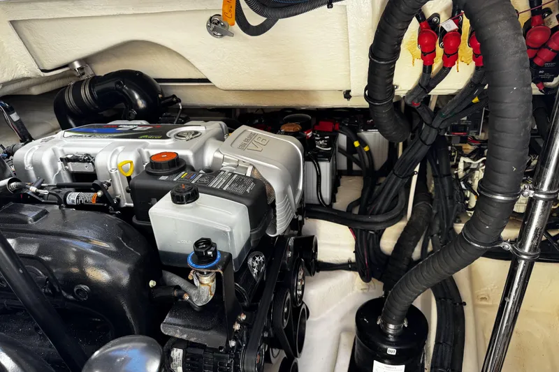 Slide: The Image of Engine compartment of 2023 Sea Ray SLX 400 boat, showcasing detailed mechanical components. - 65