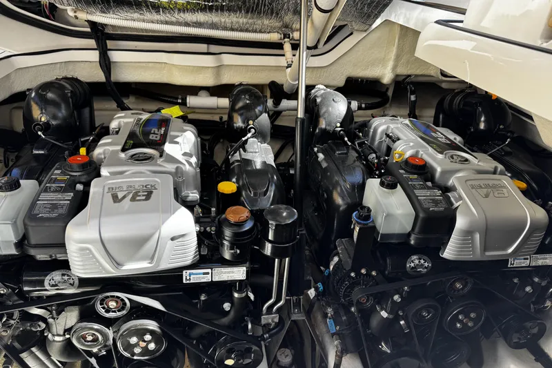 Slide: The Image of Engine compartment of 2023 Sea Ray SLX 400 with dual Big Block V8 engines. - 66