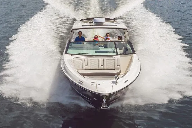 Slide: The Image of Manufacturer Provided Image: 2023 Sea Ray SLX 400 boat cruising on water with passengers. - 8