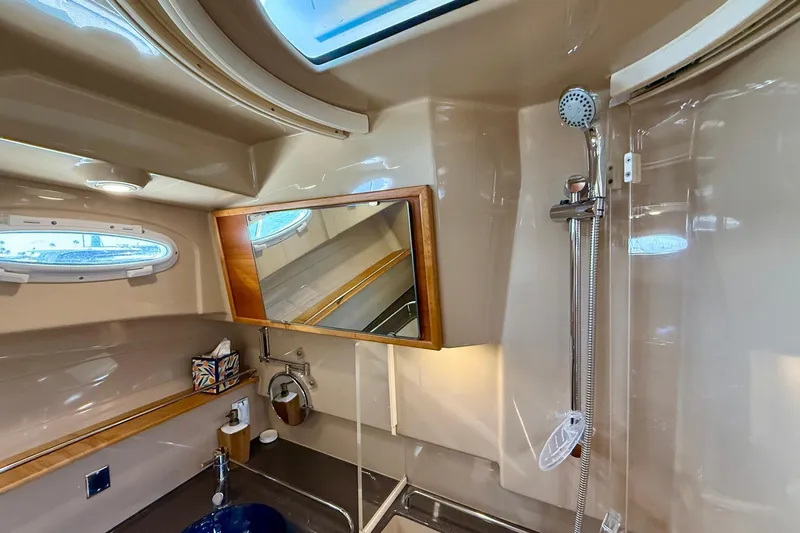 Slide: The Image of Luxurious bathroom interior of 2015 Cutwater C-30 CB yacht with shower and mirror. - 43