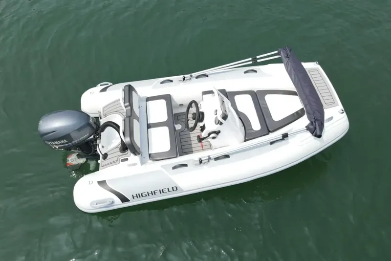 Slide: The Image of Manufacturer Provided Image: 2023 Highfield Sport 330 boat on water, top view. - 12
