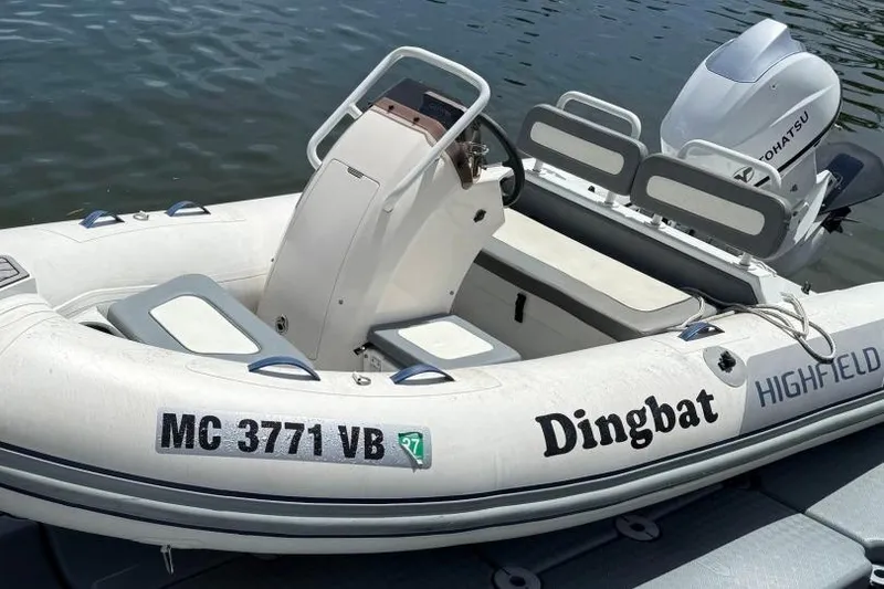Slide: The Image of 2019 Highfield Sport 330 inflatable boat named "Dingbat" with Tohatsu outboard motor. - 4