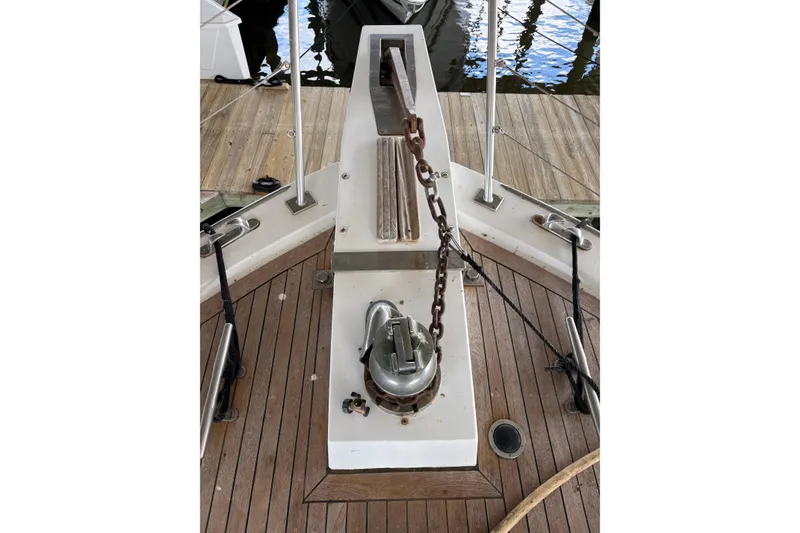 Slide: The Image of Anchor chain and windlass on 1989 Jefferson 60' Marquessa Motor Yacht deck. - 1