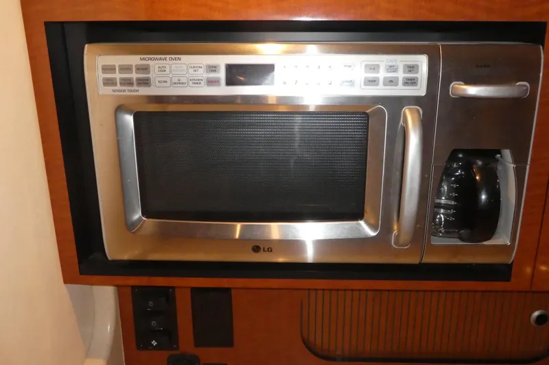 Slide: The Image of Built-in LG microwave and coffee maker on 2005 Sea Ray 340 Sundancer yacht. - 14