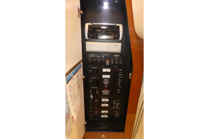 Slide: The Image of Electrical control panel inside a 2005 Sea Ray 340 Sundancer boat. - 20