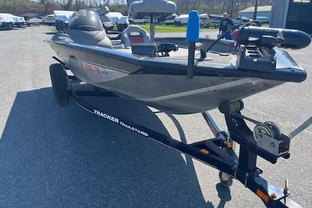 Slide: The Image of 2008 Tracker Pro Team 175 TXW boat on trailer in outdoor setting. - 6