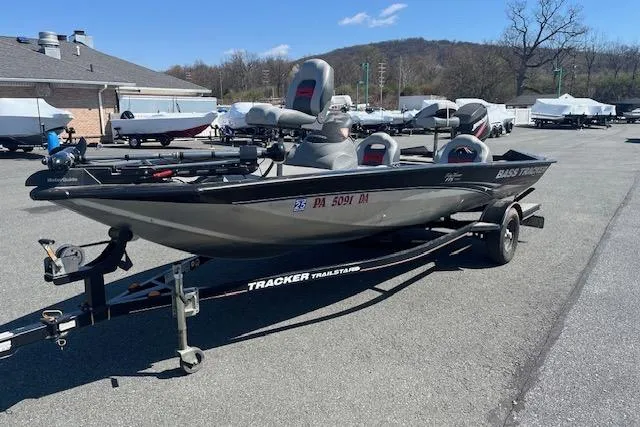 Slide: The Image of 2008 Tracker Pro Team 175 TXW fishing boat on trailer in outdoor lot. - 7