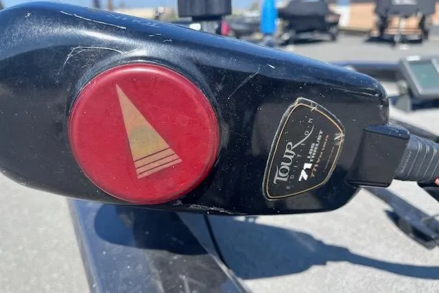 Slide: The Image of Close-up of a 2008 Tracker Pro Team 175 TXW boat control panel with red button. - 8