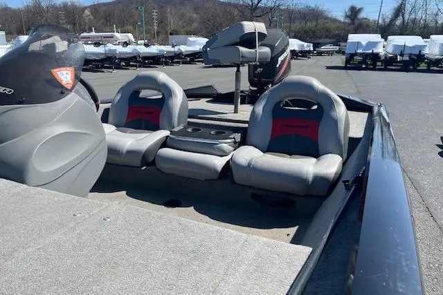 Slide: The Image of 2008 Tracker Pro Team 175 TXW boat interior with seating and console. - 9