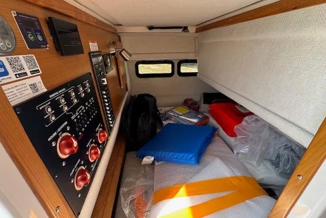 Slide: The Image of Interior cabin of 2026 Cutwater C-288 Coupe with control panel and storage area. - 36