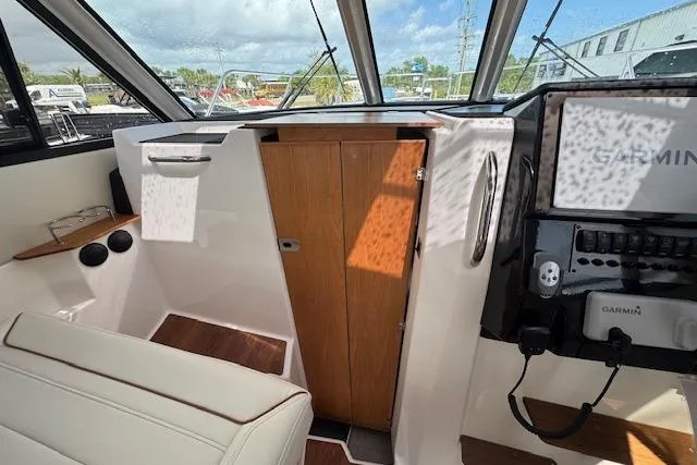 Slide: The Image of Interior of 2026 Cutwater C-288 Coupe boat with Garmin navigation system. - 38