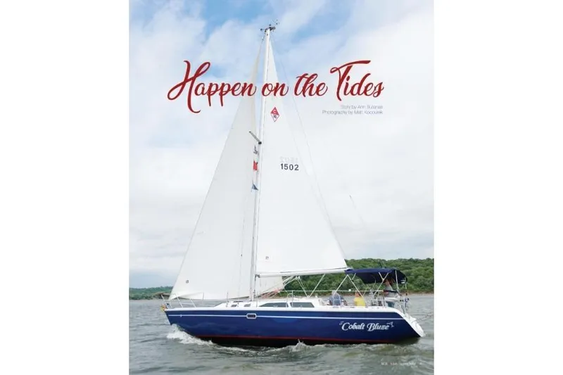 Slide: The Image of Sailboat "Cobalt Blue" Catalina 36 MkII 1995 on water under cloudy sky. - 10