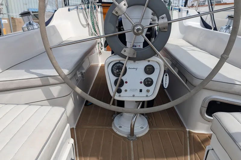 Slide: The Image of 1995 Catalina 36 MkII sailboat in indoor storage, showcasing deck and rigging. - 12