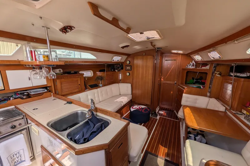 Slide: The Image of Cozy cabin interior of 1995 Catalina 36 MkII sailboat with bed and wooden furnishings. - 19