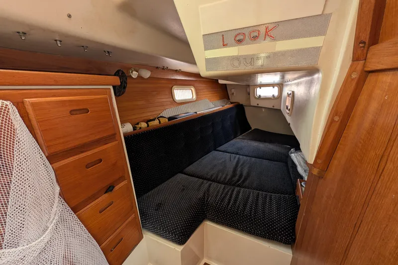 Slide: The Image of Bathroom interior of 1995 Catalina 36 MkII yacht with wooden accents and nautical decor. - 26