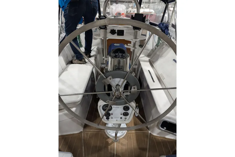 Slide: The Image of Steering wheel of a 1995 Catalina 36 MkII sailboat, showcasing cockpit details. - 3