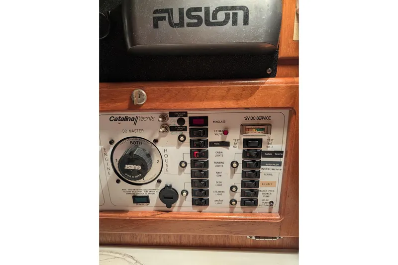 Slide: The Image of Electrical panel of a 1995 Catalina 36 MkII yacht with various switches and controls. - 5