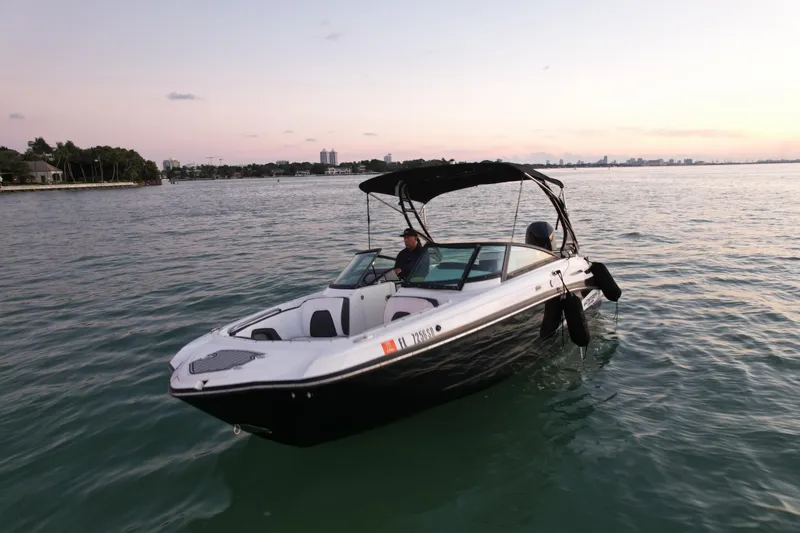 Slide: The Image of 2020 Monterey M-45 boat cruising on calm waters at sunset. - 1