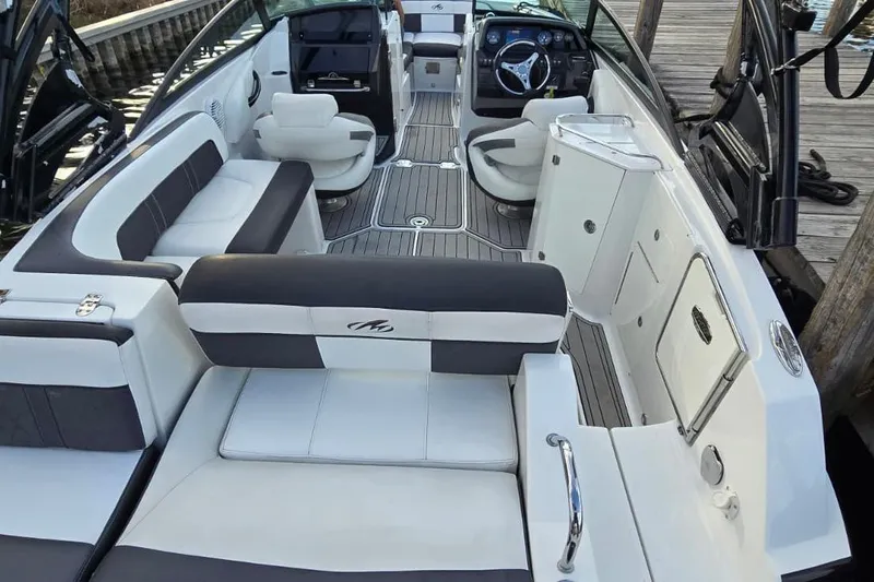 Slide: The Image of 2020 Monterey M-45 boat interior with sleek seating and modern dashboard design. - 13