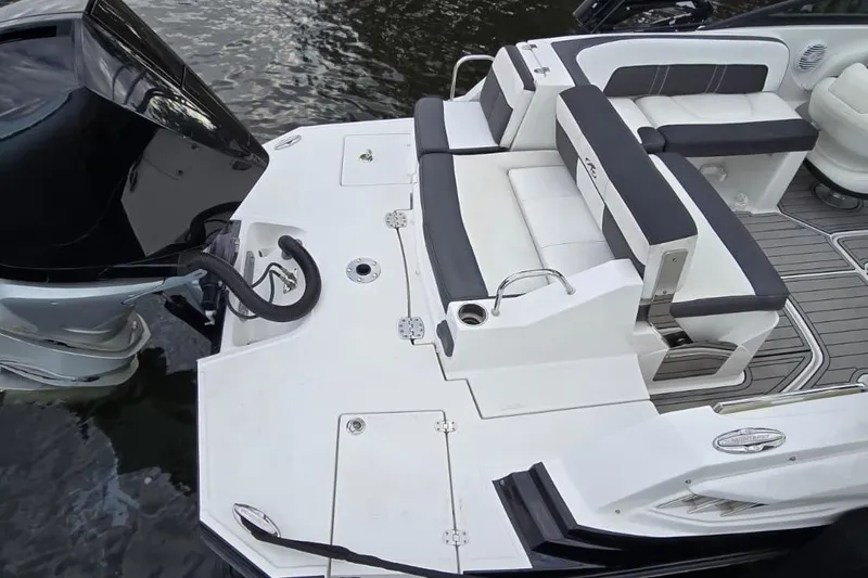 Slide: The Image of 2020 Monterey M-45 boat with sleek seating and powerful outboard motor. - 18