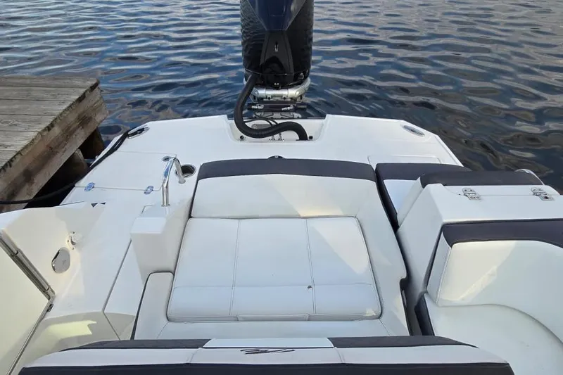 Slide: The Image of 2020 Monterey M-45 boat with sleek seating and powerful outboard motor by the dock. - 19