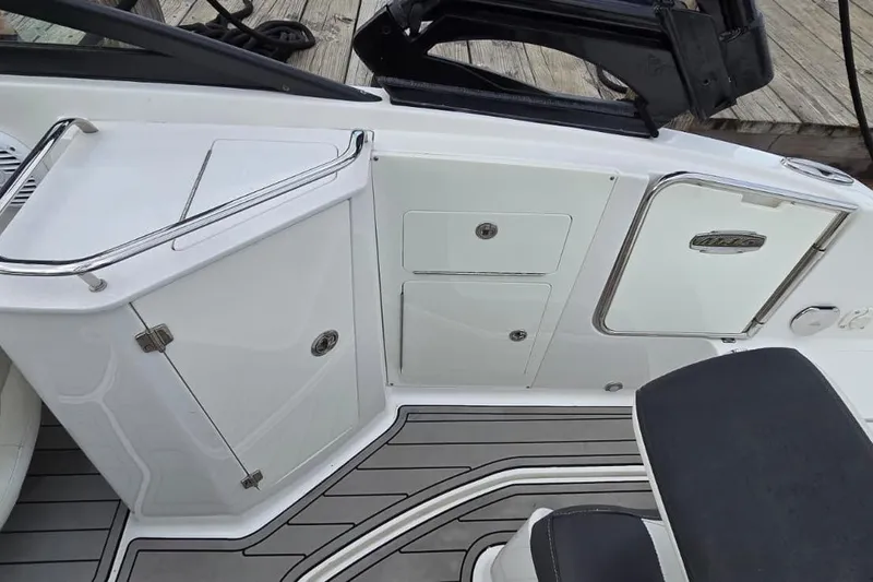 Slide: The Image of 2020 Monterey M-45 boat interior with sleek white cabinetry and seating. - 20