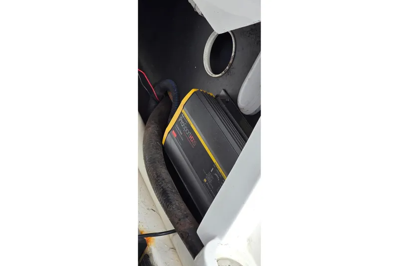 Slide: The Image of Battery charger in a 2020 Monterey M-45 boat compartment. - 23