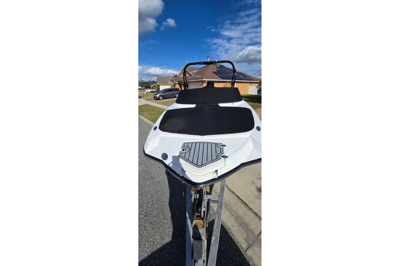 Slide: The Image of 2020 Monterey M-45 boat on trailer under blue sky. - 26