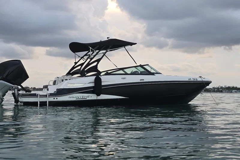 Slide: The Image of 2020 Monterey M-45 boat on calm water under cloudy sky. - 34