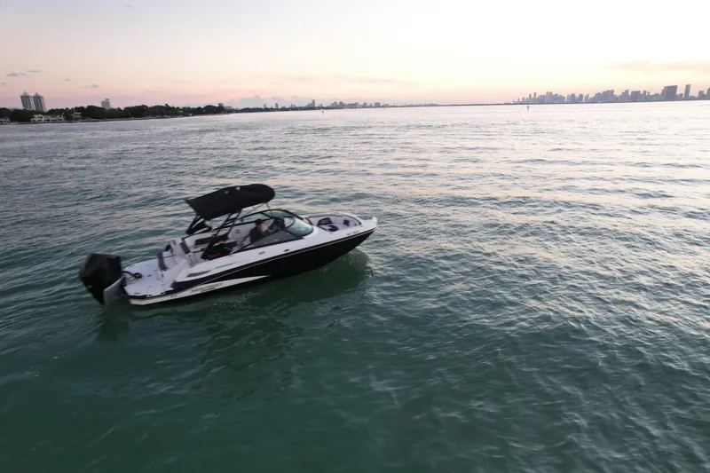 Slide: The Image of 2020 Monterey M-45 boat cruising on calm waters at sunset. - 36
