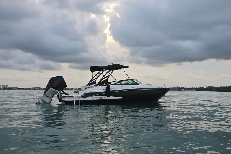 Slide: The Image of 2020 Monterey M-45 boat on calm water under cloudy sky. - 37