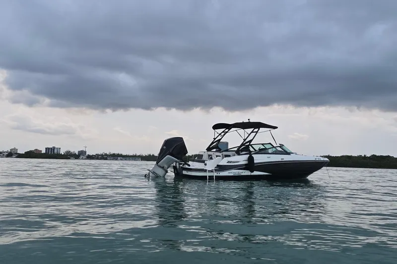 Slide: The Image of 2020 Monterey M-45 boat on calm water under cloudy sky. - 4