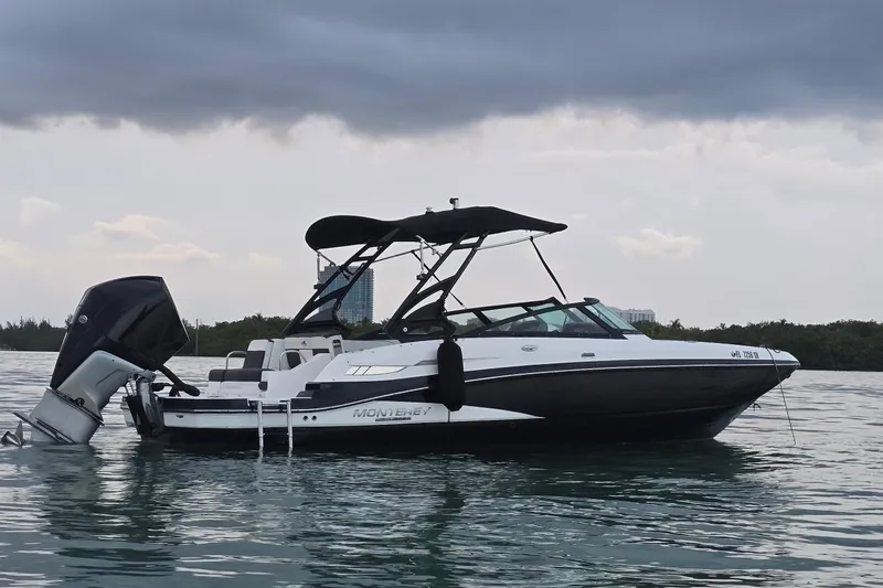 Slide: The Image of 2020 Monterey M-45 boat on calm water under cloudy sky. - 5