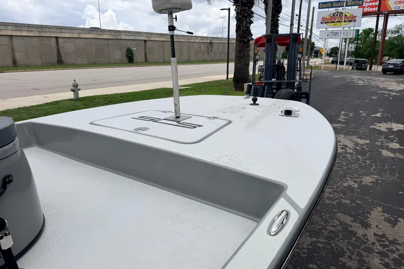 Slide: The Image of 2018 SCB Stingray boat on pavement near South Austin Marine dealership. - 11